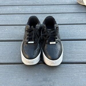 Nike Air Force 1s. Black woman’s 7.